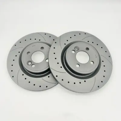Product image of R56 JCW Brembo / Budweg Front Brake Discs - Drilled & Grooved 316x22mm